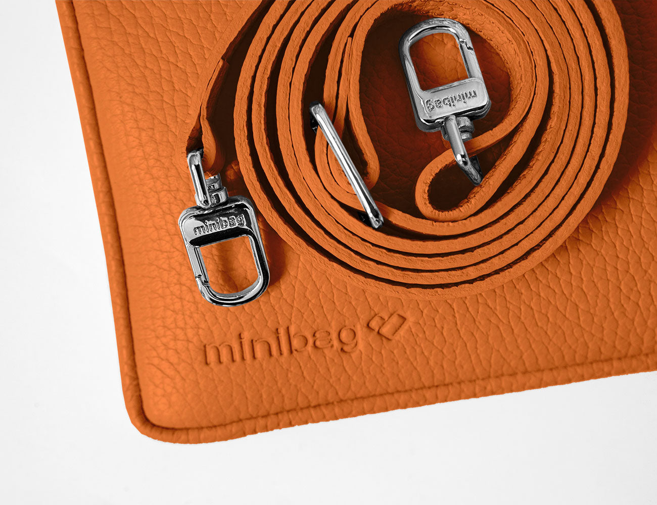 minibag orange, Ledertasche orange, Clutch orange, Detailaufnahme minibag, Ledergurt orange, minibag  Edit alt text